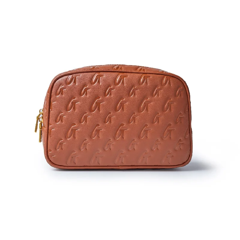 SMALL MONOGRAM TOILETRY BAG - BROWN